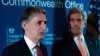 British Foreign Secretary Philip Hammond (left) and U.S. Secretary of State John Kerry