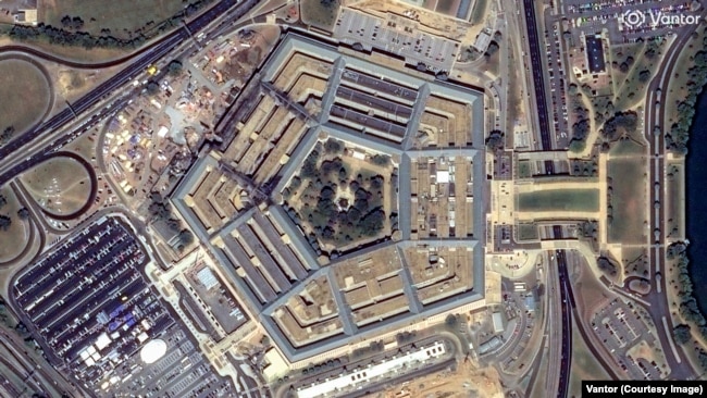 The Pentagon seen on September 15, 2001, after Al-Qaeda hijackers crashed a passenger airliner into the building as part of the September 11 attacks. All 64 people aboard the plane and 125 in the building were killed.The 2026 image of the building, located in Arlington, Virginia, was taken on September 4.