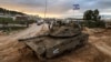 Tanke të ushtrisë izraelite në kampin e refugjatëve palestinez Xhenin në Bregun e pushtuar Perëndimor. 23 shkurt 2025.
