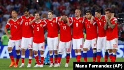 Russia national soccer team players pose during the 2018 World Cup in Sochi, Russia. The team has been barred from the 2022 World Cup, which begins in November in Qatar, because of Russia's invasion of Ukraine. 