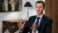 Board members of a Moscow bank have been blacklisted for allegedly providing financial services to the regime of Syrian President Bashar al-Assad (pictured, file photo).