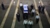 Israel -- Honor guards carry the coffin of former prime minister Ariel Sharon in to the Knesset in Jerusalem, January 12, 2014