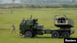 Sistem HIMARS la un exercițiu militar la Liepaja, în Lituania, la 26 septembrie 2022. 