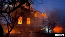 Пожар в Киеве вызванный российским ударом