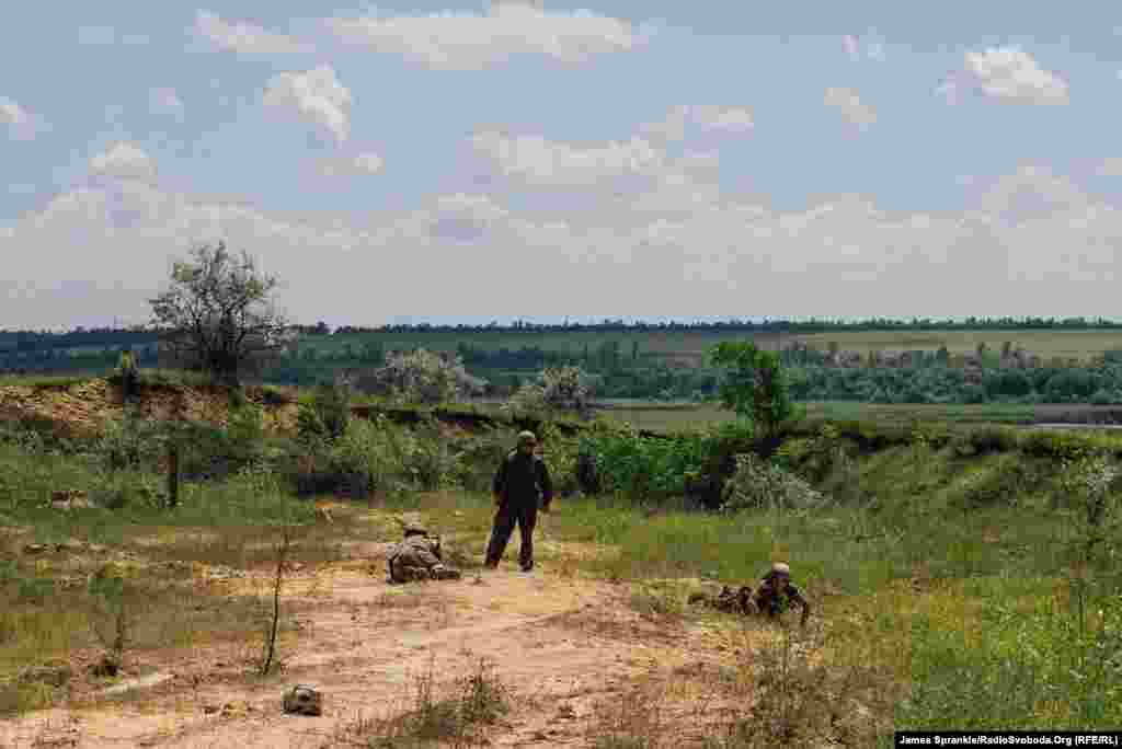 Soldiers from the 17th Battalion take part in a grenade drill at a front-line position near Dzerzhynsk and Horlivka.