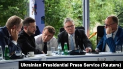 From left: Polish Prime Minister Donald Tusk, Ukrainian President Volodymyr Zelenskyy, French President Emmanuel Macron, UK Prime Minister Keir Starmer, and German Chancellor Friedrich Merz speak with US President Donald Trump by phone from Tirana on May 16.