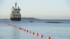 A ship lays the now-damaged telecommunications cable off the shore of Helsinki in October 2015.