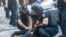 Ukrainian police detain a Tradition and Order activist in Odesa on August 28, 2021. 
