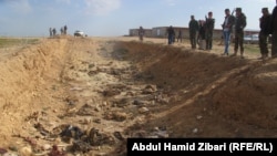 Массовое захоронение убитых езидов в Синджаре (февраль 2015 года).