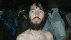 A Ukrainian soldier from the 14th Brigade of the Joint Forces Operation after days without food at his post