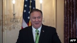 US Secretary of State Mike Pompeo delivers remarks at the Secretary of the State's Award for Corporate Excellence 20th anniversary ceremony at the State Department in Washington, DC, on October 31, 2019. 