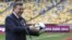 Ukrainian President Viktor Yanukovych plays around in Kyiv's Olympic Stadium, one of the scheduled venues for Euro 2012.