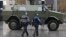 A military vehicle and police in front of the Central Railways station in Brussels on November 21