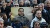 Armenia - A protester holds a picture of Artur Sargsian at a rally in Yerevan, 17Mar2017.