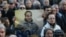 Armenia - A protester holds a picture of Artur Sargsian at a rally in Yerevan, 17Mar2017.