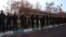 Members of the Iranian police stand guard at a protest in front of the British Embassy in Tehran on January 14.
