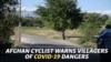 'They Are Innocent': Afghan Cyclist Warns Children Of COVID-19 Dangers