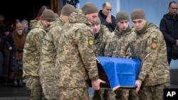 Ուկրաինացի զինծառայողի հուղարկավորություն, արխիվ