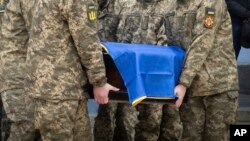 Ուկրաինացի զինծառայողի հուղարկավորություն, արխիվ