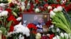 Flowers piled up near the grave of late opposition leader Aleksei Navalny in Moscow after tens of thousands of people stood outside the church where his funeral was held on March 1. 