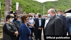 Armenia - President Armen Sarkissian talks to residents of Davit Bek village during a visit to Syunik province, April 20, 2021.