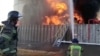 Тушение пожара после атаки беспилотников по порту в Азове Ростовской области