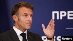 Serbia - French President Emmanuel Macron speaks during a joint press conference with Serbian President Aleksandar Vucic in Belgrade, August 29, 2024.