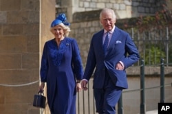 Regele Charles al III-lea al Marii Britanii și Camilla, regina consoartă, participă la slujba de Paște la Capela Sfântul Gheorghe, de la Castelul Windsor, Anglia 9 aprilie 2023.