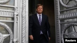 U.S. Ambassador to Russia Michael McFaul leaves the Foreign Ministry headquarters in Moscow. Analysts tell RFE/RL that he did well in his tenure during a difficult period in bilateral relations.