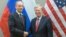 U.S. national-security adviser John Bolton (right) shakes hands with Russian counterpart Nikolai Patrushev during a meeting at the U.S. Mission in Geneva in August.