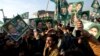 Supporters of former Pakistani Prime Minister Nawaz Sharif shout slogans against the government outside an accountability court in Islamabad on December 24.