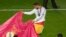 Portugal - Real Madrid's Sergio Ramos performs a bull fight as he celebrates after defeating Atletico Madrid in their Champions League final soccer match at the Luz Stadium in Lisbon May 24, 2014.