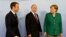 Емманюель Макрон, Володимир Путін і Анґела Меркель перед початком переговорів у Гамбурзі, літо 2017 року