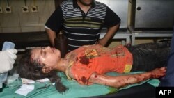 Ranjena sirijska djevojčica u Alepu, 27. maja 2016.