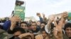 Libyan Protests Rage As Army Divisions Emerge