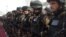 Afghan security forces stand during a ceremony to hand over security control in Badakhshan province, Faisabad, in January 2012.