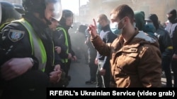 Kiýewde aşa-sagçy demonstrantlar polisiýa bilen çaknyşdylar. 9-njy mart.