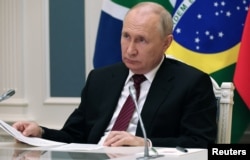 Presidenti rus, Vladimir Putin, pati marrë pjesë online në samitin e BRICS-it një vit më parë.