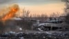 A Ukrainian tank fires at Russian positions in Chasiv Yar during fighting in February.