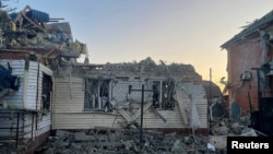 The aftermath of what local authorities called a Ukrainian military strike in the town of Sudzha in Russia's Kursk region on August 6.