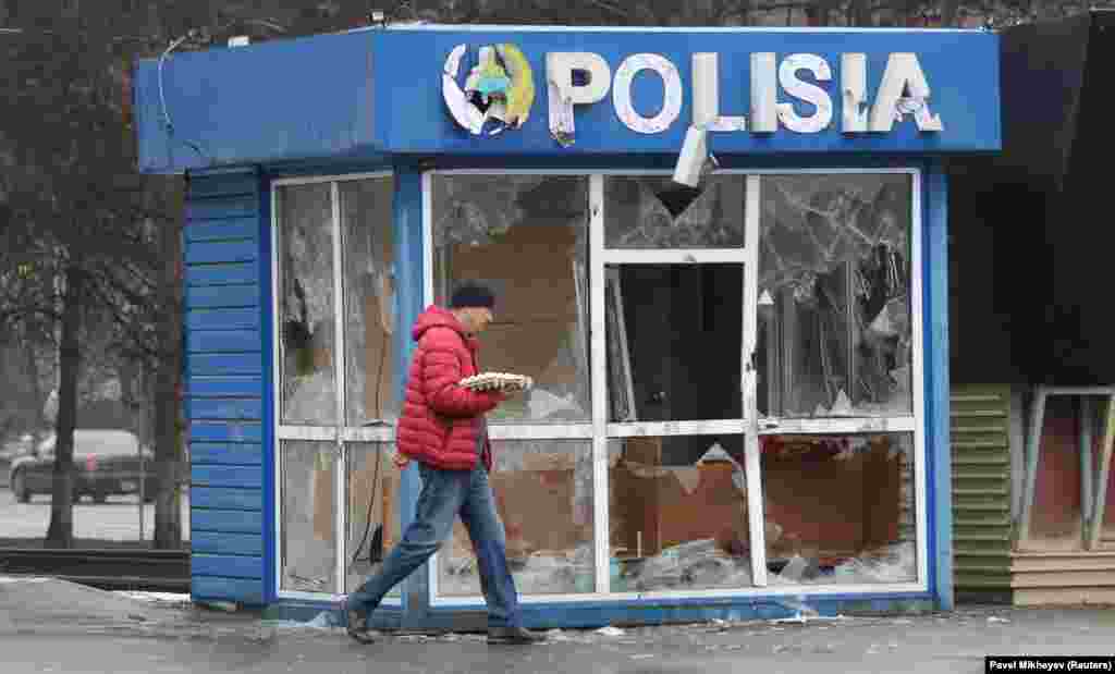A heavily damaged police kiosk in Almaty on January 8.&nbsp;