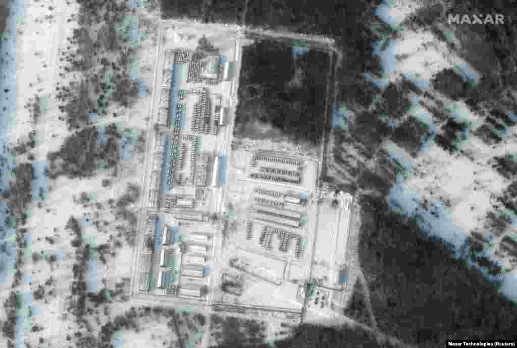 Military equipment massed at the Klimovo storage facility on January 19. Older imagery from Google Maps of the same location shows a fraction of the military vehicles present.&nbsp;