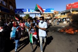 Демонстрация против военной хунты в Хартуме, столице Судана. 6 января 2022 года