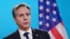U.S. Secretary of State Antony Blinken addresses a press conference after meeting with his counterparts from Germany, France, and Britain in Berlin on January 20. 