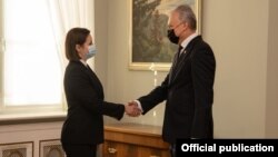 Сьвятлана Ціханоўская і  літоўскі прэзыдэнт Гітанас Наўседа