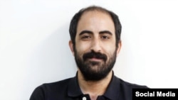Amir-Abbas Azarmvand worked for the state-run financial newspaper SMT.