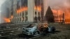 A burned-out car lies abandoned outside the Almaty mayor’s office, which was set ablaze earlier this month amid widespread protests over rising fuel prices that led to deadly clashes.