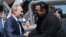 Russian President Vladimir Putin (left) talks to U.S. actor Steven Seagal while visiting the oceanarium on Russkiy island outside Vladivostok in September 2015.