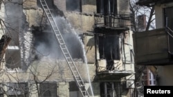 რუსეთის საჰაერო დარტყმებით განადგურებული სახლი დნიპროში(ფოტო არქივიდან)