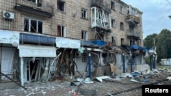 A photo released by the Ukrainian National Police shows a residential building damaged during a Russian drone strike in the town of Konotop, Sumy region, Ukraine, on September 12. 